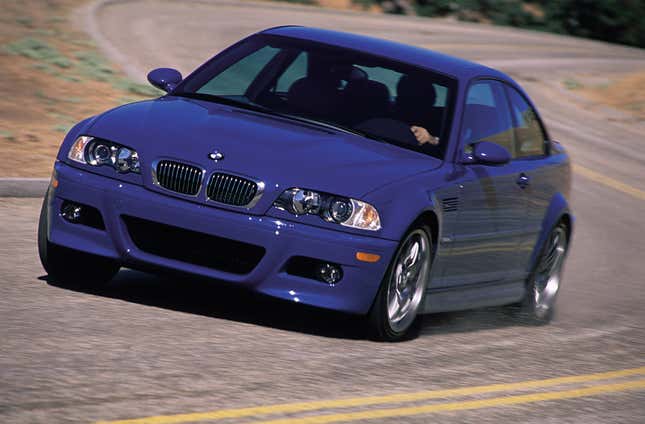 Front quadrant image of a blue BMW M3 in the middle corner